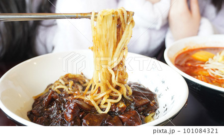 jjajangmyeon in the bowl with chopsticks 101084321