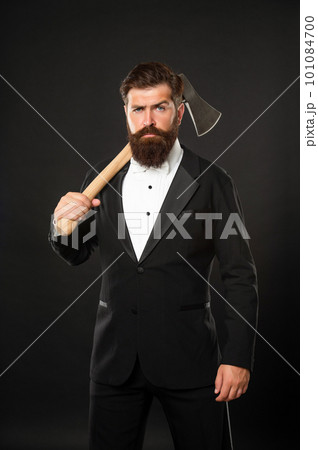 Well bearded and moustached. Bearded man carry hatchet. Axe shave and haircut. Barbershop 101084700