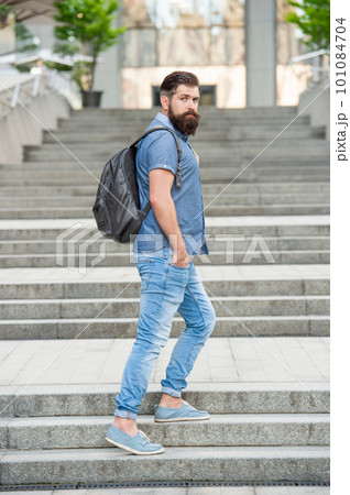 bearded man tourist with backpack. tourist with beard. brutal tourist outdoor bearded man tourist with backpack. tourist with beard. brutal tourist outdoor 101084704