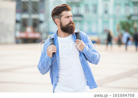 bearded man hipster outside. portrait of hipster with beard. brutal casual hipster outdoor 101084708