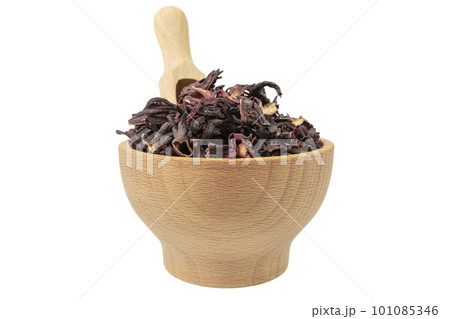 Dry hibiscus tea in wooden bowl and scoop isolated on white background. herb. herbal tea. food ingredient. Dry hibiscus tea in wooden bowl and scoop isolated on white background. herb. herbal tea. food ingredient. 101085346