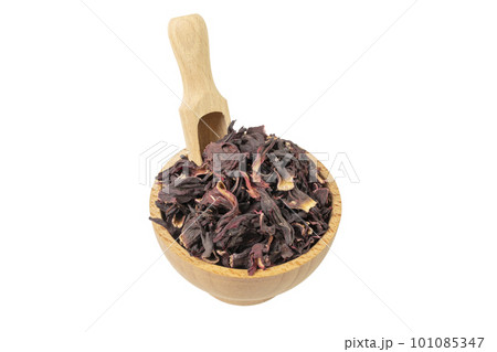 Dry hibiscus tea in wooden bowl and scoop isolated on white background. herb. herbal tea. food ingredient. Dry hibiscus tea in wooden bowl and scoop isolated on white background. herb. herbal tea. food ingredient. 101085347