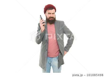 Man bearded hipster hold mobile phone white background. Difficulties mobile communication. Hipster smartphone call friend. Stylish guy use mobile phone. Mobile call concept. Important conversation 101085498