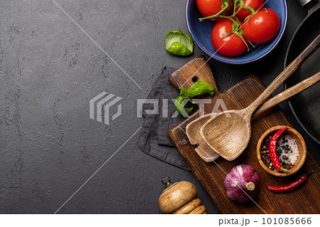 Top-down view of a kitchen table with ingredients, utensils, and copy space Top-down view of a kitchen table with ingredients, utensils, and copy space 101085666