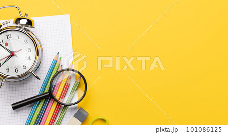 School supplies and stationery on yellow 101086125
