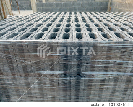 Closeup of the concrete block with the plastic wrap. 101087619