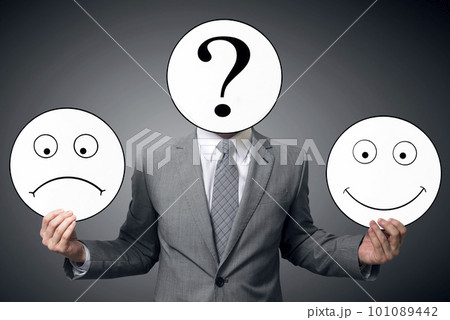 Conceptual image of a man changing his mood from bad to good 101089442