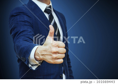 Businessman shows thumb up sign gesture. Nonverbal communication 101089443