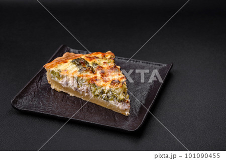 Delicious quiche with broccoli, cheese, chicken, spices and herbs Delicious quiche with broccoli, cheese, chicken, spices and herbs 101090455
