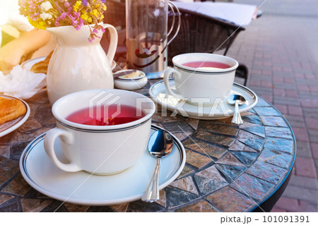 Fruit tea on a table in a cafe 101091391