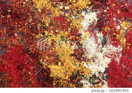 Various spices and seasonings as a background. Seasoning texture, top view Various spices and seasonings as a background. Seasoning texture, top view 101091403
