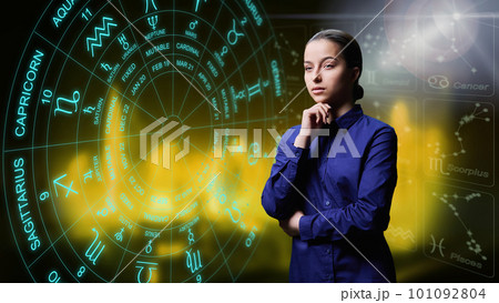 Portrait of dreamy young female on background with horoscope astrological signs Portrait of dreamy young female on background with horoscope astrological signs 101092804