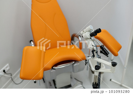 Gynecological room with chair and equipment selective focus 101093280