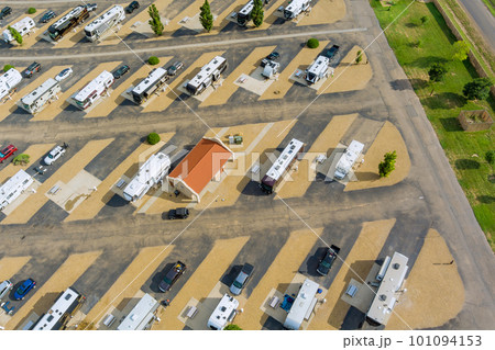 Trailer RV vacation at recreational vehicle park camping area Trailer RV vacation at recreational vehicle park camping area 101094153