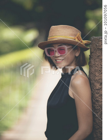 beautiful asian woman wearing straw hat toothy smiling with happiness face 101097056
