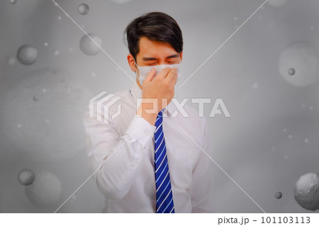 Asian man wear masks to protect PM 2.5 dust and air pollution, air pollution concept, healthcare concept. 101103113