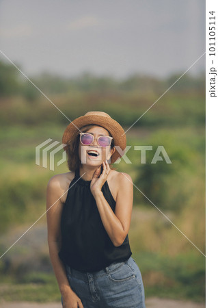 happiness face of asian woman standing outdoor 101105114