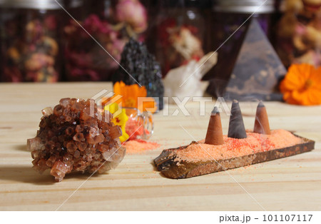 Aragonite Crystal With Incense and Stone Pyramid on Meditation Altar Aragonite Crystal With Incense and Stone Pyramid on Meditation Altar 101107117