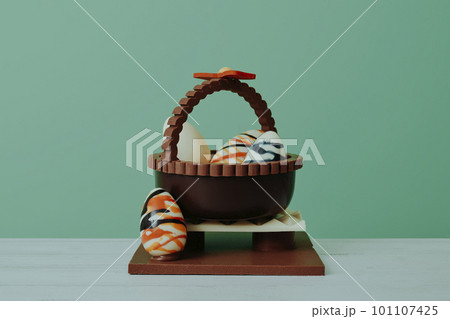 basket with eggs as spanish mona de pascua 101107425