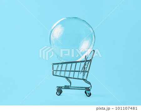 Shopping cart with soap bubble on blue background 101107481