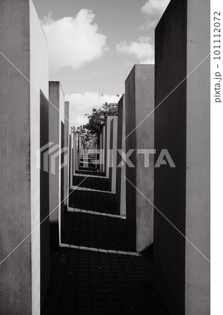 Greyscale shot of the Memorial to the Murdered Jews of Europe in Berlin, Germany Greyscale shot of the Memorial to the Murdered Jews of Europe in Berlin, Germany 101112072