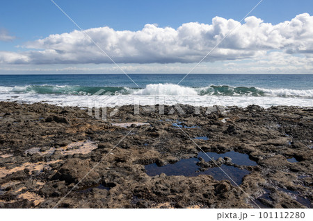 Rocky coastline in Puerto del Rosario, Spain Rocky coastline in Puerto del Rosario, Spain 101112280