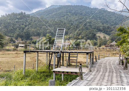 Structure at Pai Buddha bamboo bridge or Boon Ko Ku So walkway across rice fields. Thai words translated as Garden Heaven Stairs in English Language. 101112356
