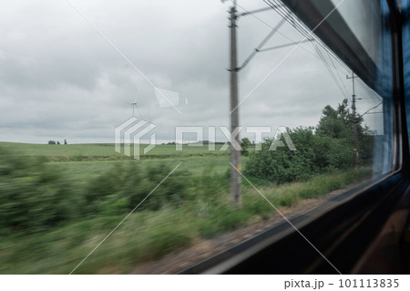 Countryside view outside the train window - travel, transport, journey concept. Countryside view outside the train window - travel, transport, journey concept. 101113835