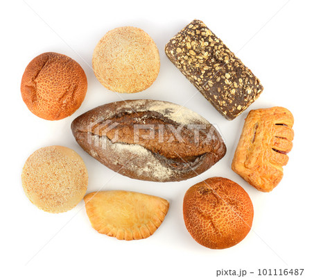 Beautiful baked bread and buns isolated on white. Top view. Beautiful baked bread and buns isolated on white. Top view. 101116487