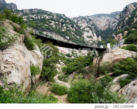 Hanging bridge in sacred taoist Songshan mountains in Henan province, China Hanging bridge in sacred taoist Songshan mountains in Henan province, China 101116508