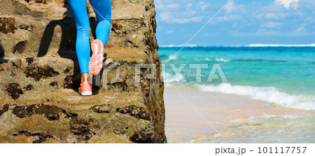 Young girl with slim body running up by stairs 101117757