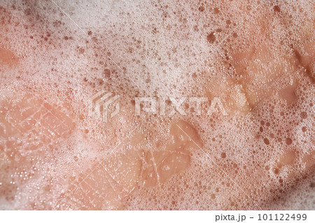 Photo of the texture of cosmetic foam or soap on the hand. Photo of the texture of cosmetic foam or soap on the hand. 101122499