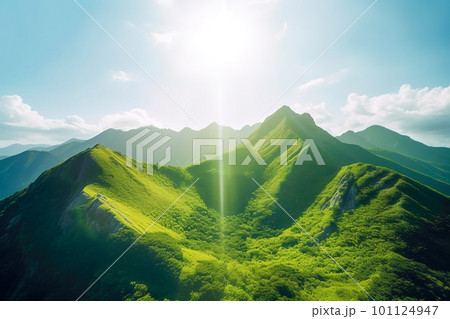 Beautiful sunrise over the green mountains in morning light with fluffy clouds on a bright blue sky. Nature freshness concept Beautiful sunrise over the green mountains in morning light with fluffy clouds on a bright blue sky. Nature freshness concept 101124947