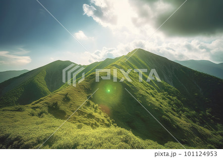 Beautiful sunrise over the green mountains in morning light with fluffy clouds on a bright blue sky. Nature freshness concept 101124953