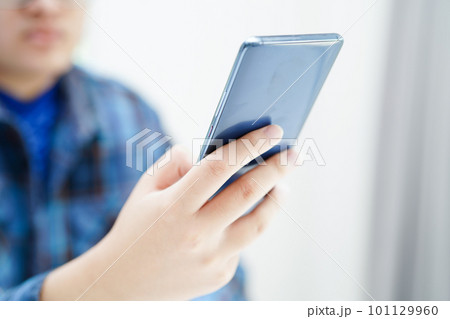 Asian teenage using mobile application in digital smartphone technology for learning. 101129960