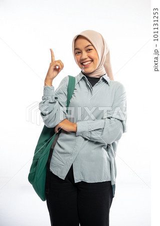Asian female university student in veil stand with cheerful face 101131253