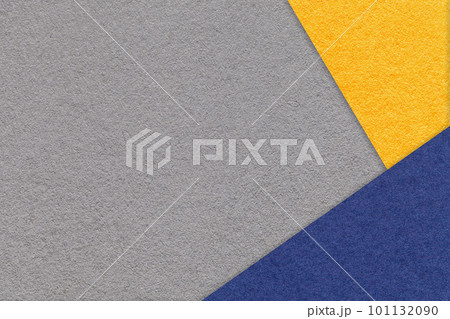 Texture of craft gray color paper background with yellow and navy blue border. Vintage abstract grey cardboard. 101132090