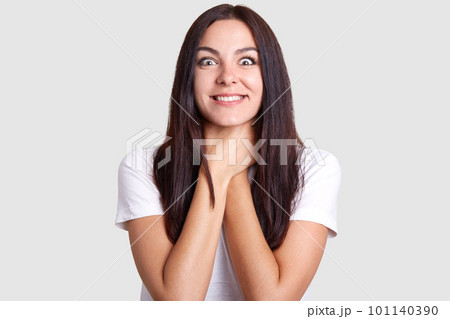 These sunny eyes and bright, wide smile of stranger, makes it clear that she likes to hold herself by throat with her hands, because this posture is very unusual for models and looks interesting. These sunny eyes and bright, wide smile of stranger, makes it clear that she likes to hold herself by throat with her hands, because this posture is very unusual for models and looks interesting. 101140390