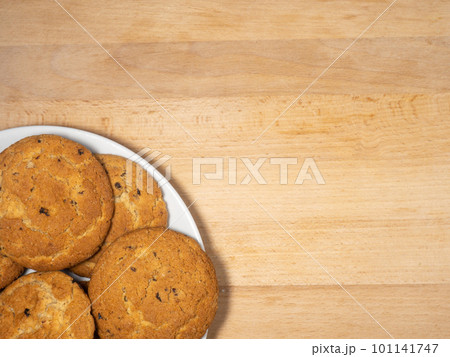 Oat cookies. Cookies with raisins on the table. Sweet treat. Healthy diet. Oat cookies. Cookies with raisins on the table. Sweet treat. Healthy diet. 101141747
