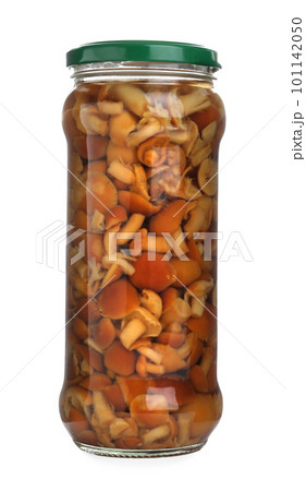 Glass jar with pickled mushrooms isolated on white Glass jar with pickled mushrooms isolated on white 101142050