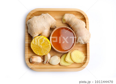 Fresh garlic and other natural cold remedies isolated on white, top view 101144470