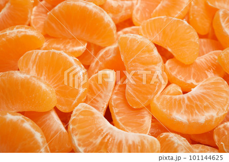 Fresh juicy tangerine segments as background, closeup 101144625