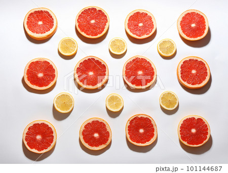 Flat lay composition with tasty ripe grapefruit slices on white background 101144687