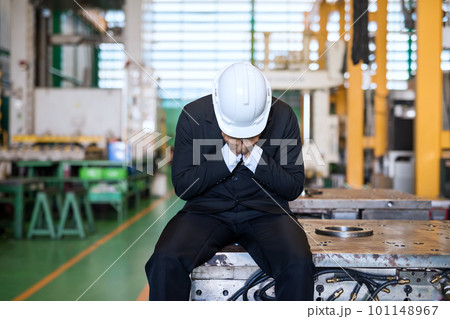 Cry factory owner in warehouse. bankruptcy or business close 101148967