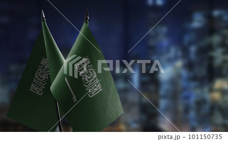 Small flags of the Saudi Arabia on an abstract blurry background 101150735