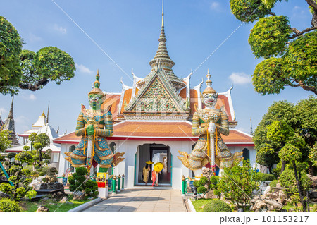 Two huge giant statues standing guard in Wat Arun are the symbol of this temple. Bangkok Thailand 101153217