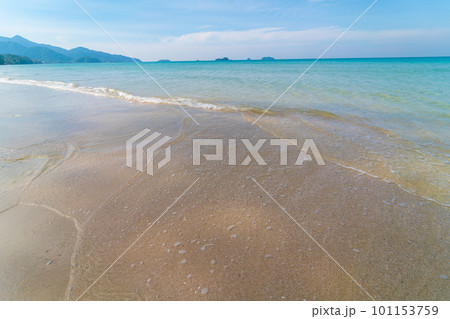 Sea beach wave clear turquoise sea water smooth sand blue sky with cloud Sea beach wave clear turquoise sea water smooth sand blue sky with cloud 101153759