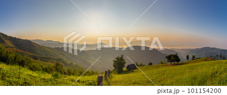 Panorama Landscape of Beautiful sunset mountain view with morning mist at Doi Chang, Chiang Rai, Thailand Panorama Landscape of Beautiful sunset mountain view with morning mist at Doi Chang, Chiang Rai, Thailand 101154200