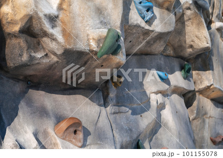 artificial modern climbing wall for climbers close-up 101155078