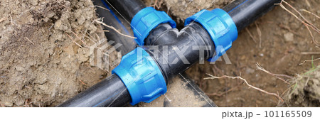 Black plastic pipes for irrigation in country 101165509